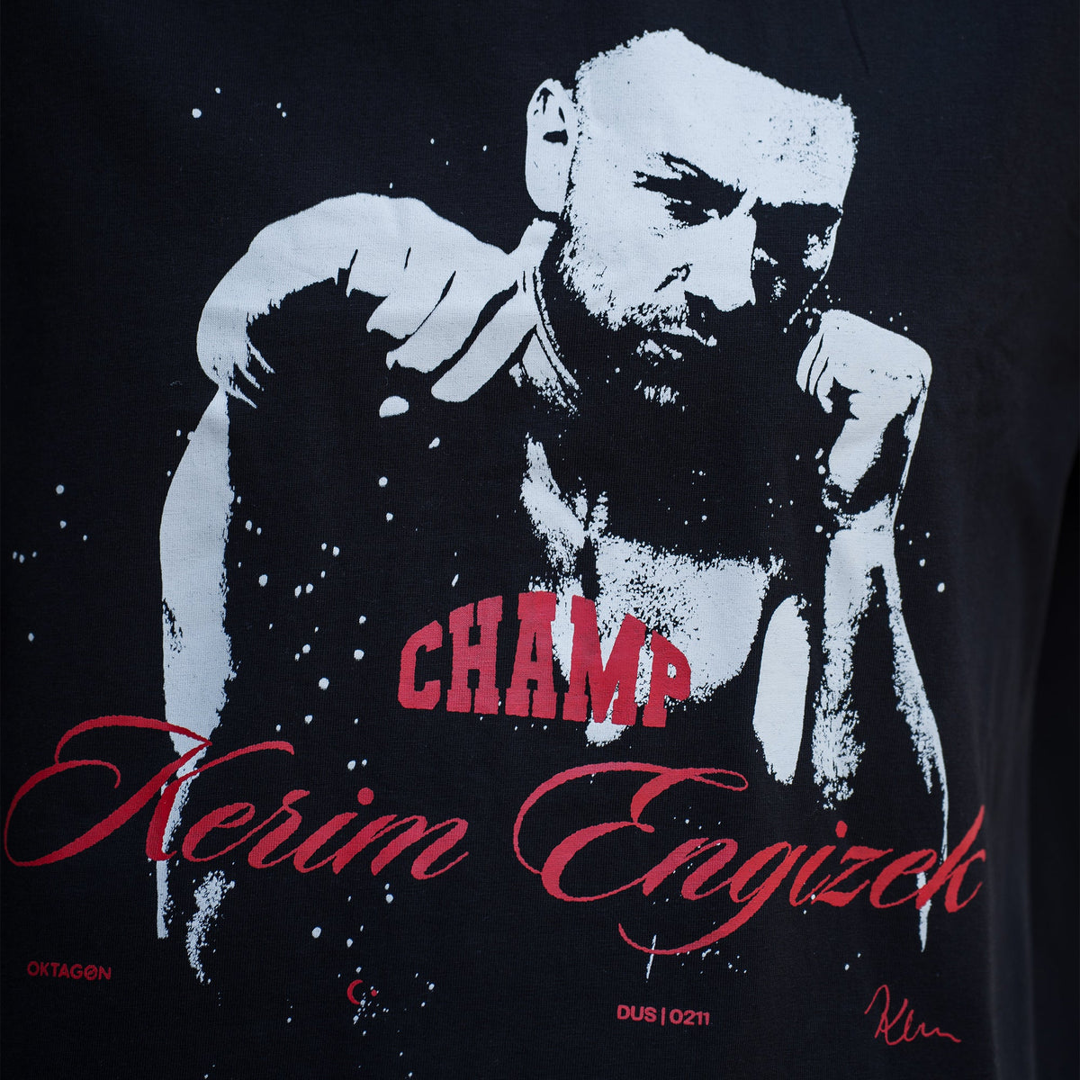KERIM ENGIZEK “CHAMP” T-SHIRT 2026 - OKTAGON Store